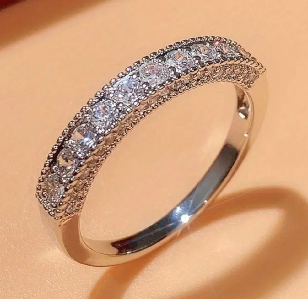 Rings 925 Sterling Silver Eternity Ring with Multiple Inlaid Zirconia's
