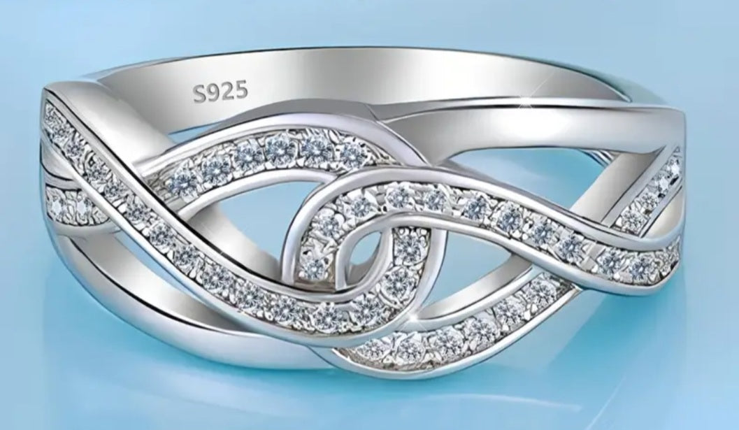 Rings 925 Silver Twist Infinity Zirconia's Ring ( Size 9 with Adjuster to fit Sizes 7 and 8 )