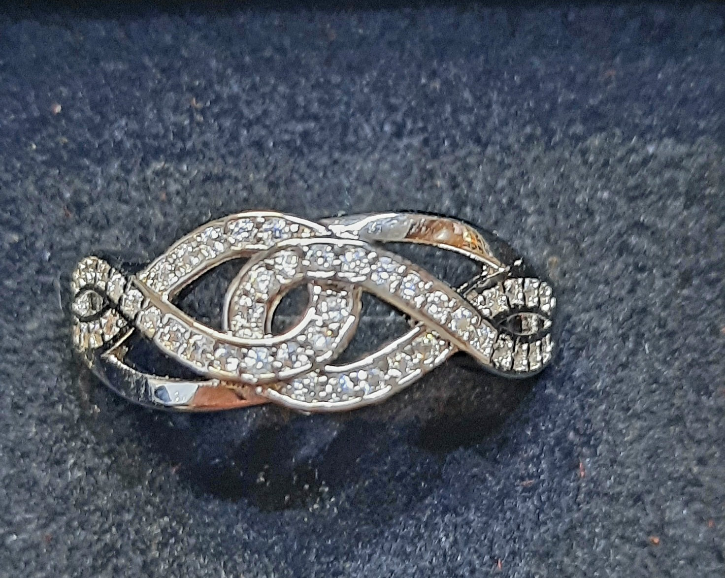 Rings 925 Silver Twist Infinity Zirconia's Ring ( Size 9 with Adjuster to fit Sizes 7 and 8 )