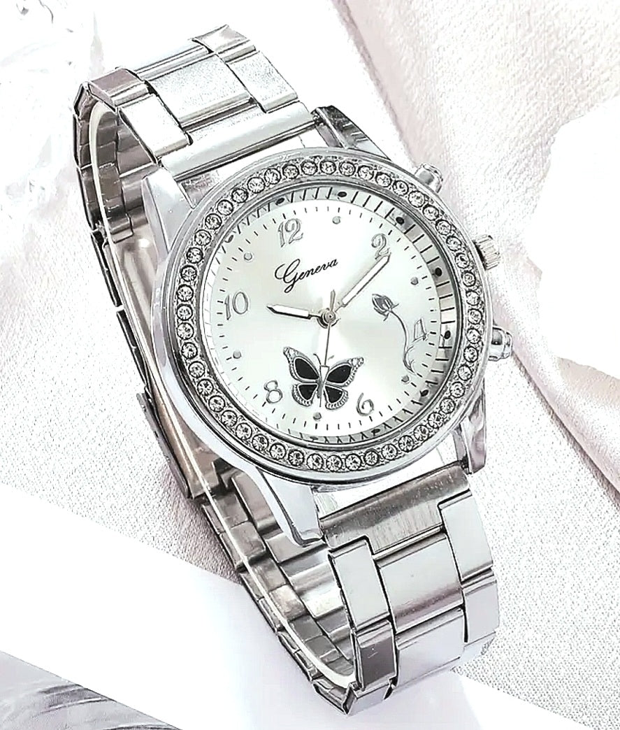 Watches a Beautiful Silver Quartz set with Butterfly and Zirconia's Detail.