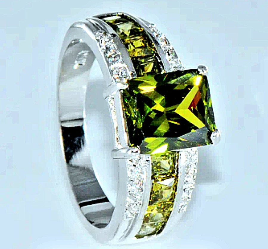 Rings a Beautiful Olive Color Zirconia Setting with smaller Olive and White Zirconia's. Titanium (No Tarnish)